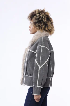 GIUBBOTTO morbida e scamosciata di tendenza con interno in teddy e comode tasche laterali