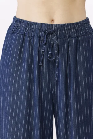 PANTALONE in tessuto tencel rigato con risvolti alle caviglie