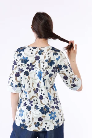 BLUSA fantasia di fiori ampia con girocollo basso tagliato sul davanti