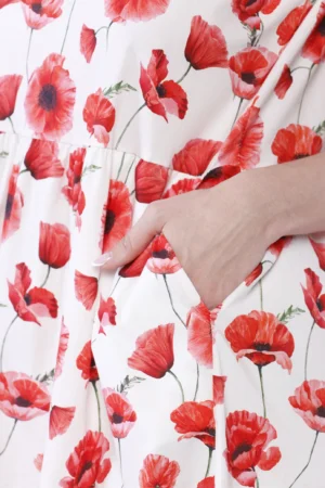 ABITO a fiori smanicato con gonna stratificata a sbuffo e bottoncino di chiusura posteriore