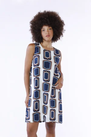 ABITO a fantasia geometrica smanicato con bottoncino di chiusura sul dorso