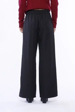 PANTALONE a zampa larga con tasche bottone di chiusura e passanti alla cintura