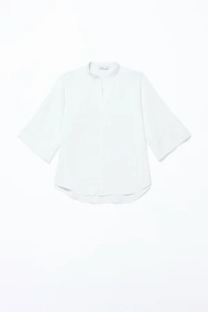 BLUSA a fantasia di foliage con scollo a giro e orli  a sbuffo