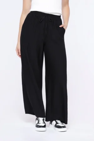 PANTALONE palazzo con tasche e cinturino elasticizzato con fiocchetto