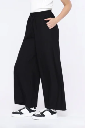 PANTALONE palazzo con tasche e cinturino elasticizzato con fiocchetto