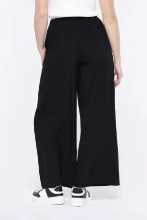 PANTALONE palazzo con tasche e cinturino elasticizzato con fiocchetto