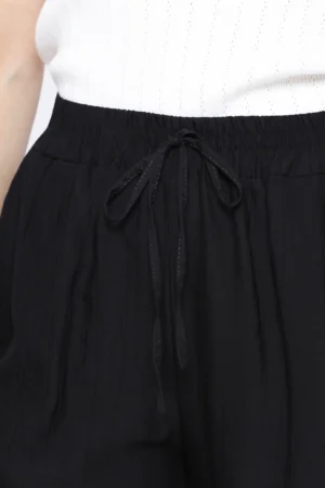 PANTALONE palazzo con tasche e cinturino elasticizzato con fiocchetto